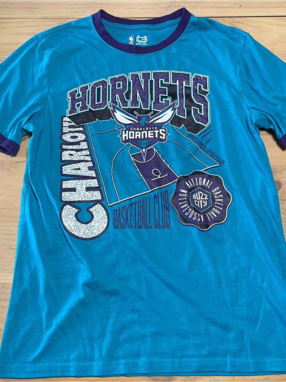 NBA Charlotte Hornets Teal and Purple Graphic Tee